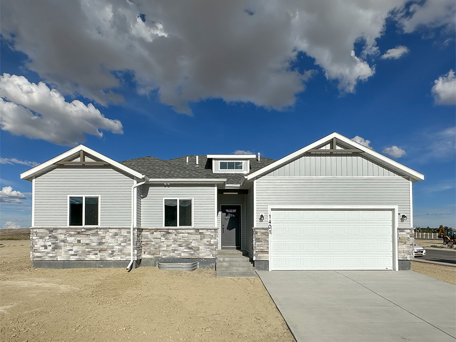 Stone and siding with complimentary grays on ranch floor plan The Edison at 1401 Kaye Way in Rock Springs WY Stone and siding with complimentary grays on ranch floor plan The Edison at 1401 Kaye Way in Rock Springs WY